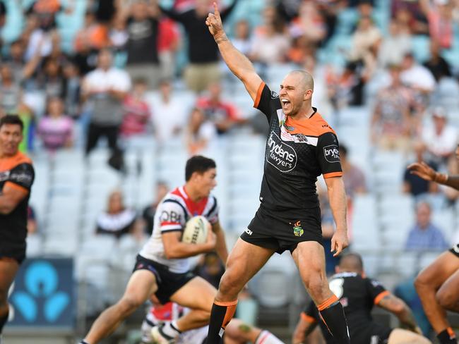 Robbie Rochow celebrates after their win over the Roosters.