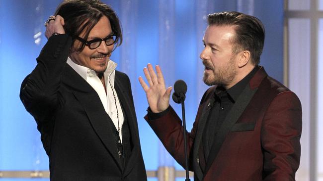 Johnny Depp looks nervous as he’s grilled by Ricky Gervais at the 69th Golden Globe Awards.