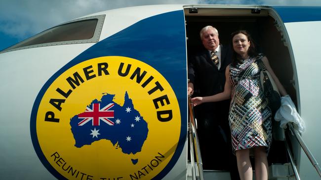 Clive Palmer with his wife Anna board a flight on his private jet. Picture: Hamish Cairns