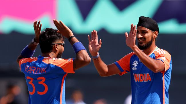 Arshdeep Singh and Hardik Pandya during the match between India and Pakistan. Picture: Robert Cianflone/Getty Images