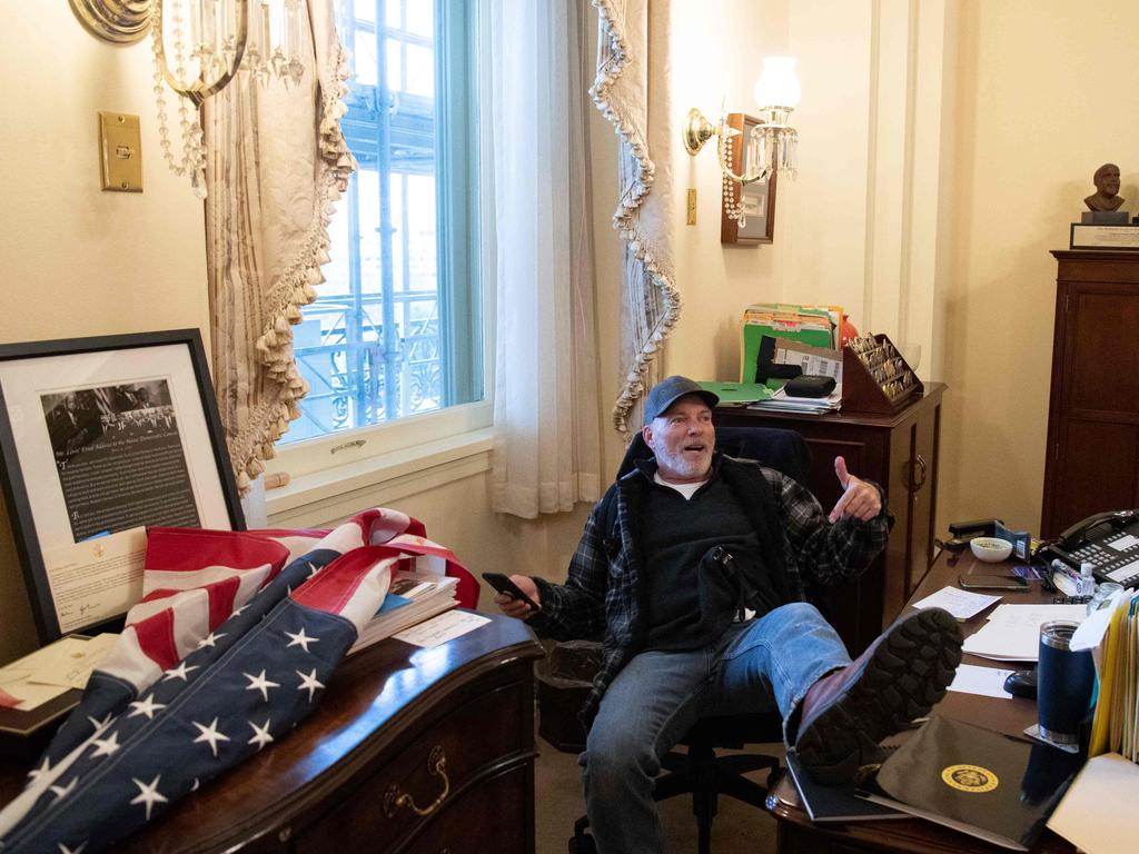 Trump supporter Richard Barnett occupied Speaker Nancy Pelosi’s office during the insurrection. Picture: AFP