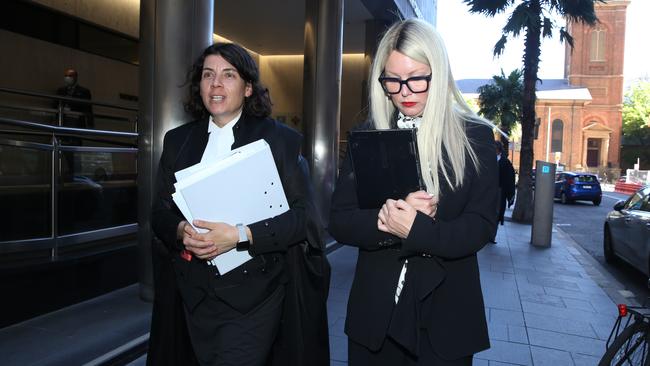 Elaine Stead leaving Federal court with her lawyer in the defamation trial against journalist Joe Aston. Picture: Jane Dempster