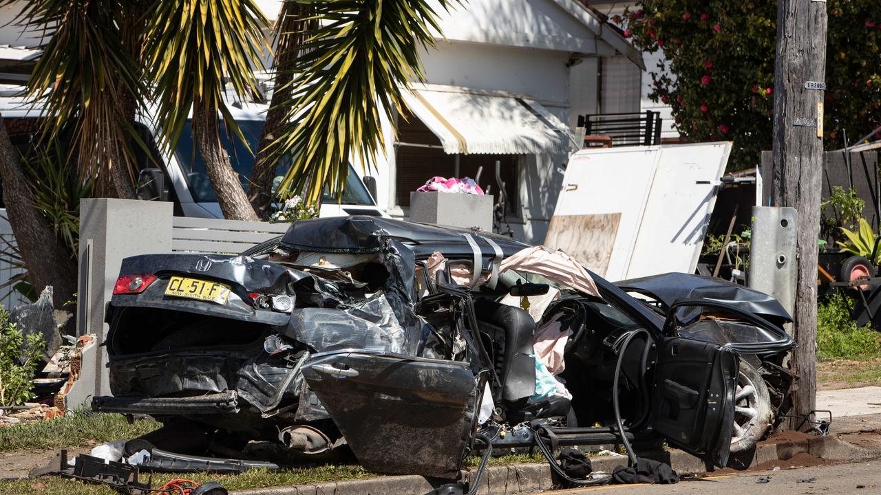 The car was mangled after the crash with one male passenger trapped in the back seat for some time. Picture: The Daily Telegraph