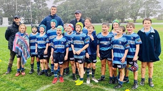 Joseph Suaalii, at the back, spent time with Mosman Whales under-10s side over the weekend.