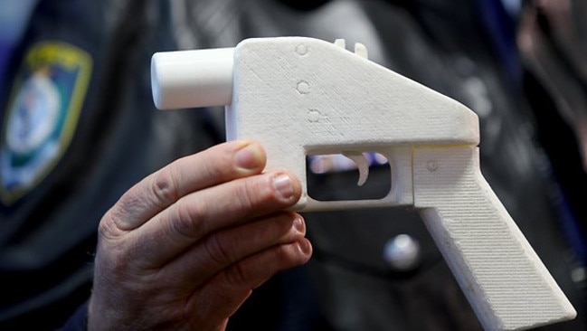 NSW’s Police Pommissioner showing off their 3D-printed gun.