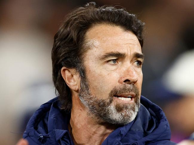 MELBOURNE, AUSTRALIA - SEPTEMBER 21: Chris Scott, Senior Coach of the Cats addresses his players during the 2024 AFL Second Preliminary Final match between the Geelong Cats and the Brisbane Lions at The Melbourne Cricket Ground on September 21, 2024 in Melbourne, Australia. (Photo by Michael Willson/AFL Photos via Getty Images)