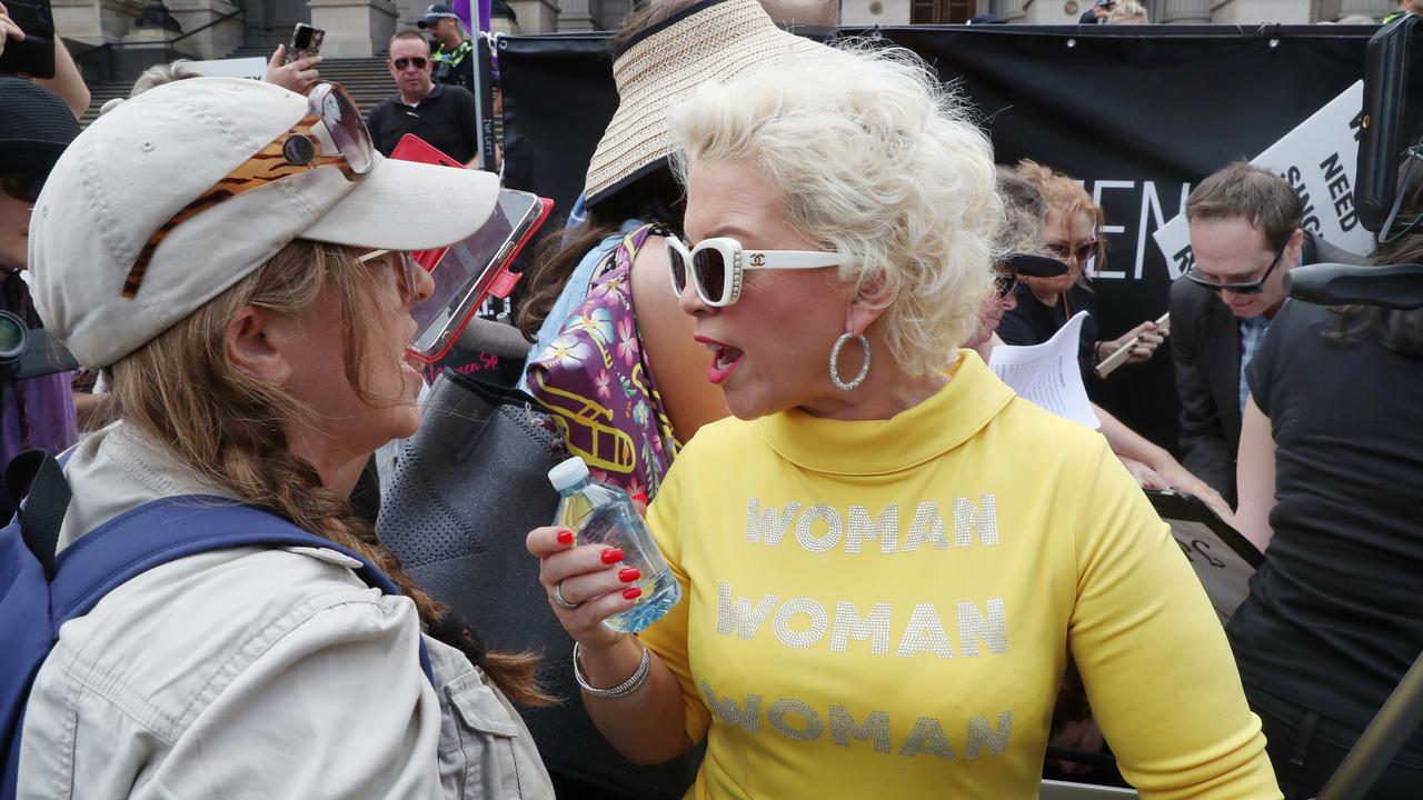 Ms Keen-Minshull arguing with pro-trans supporters on Saturday along Spring St. Picture: NCA NewsWire / David Crosling