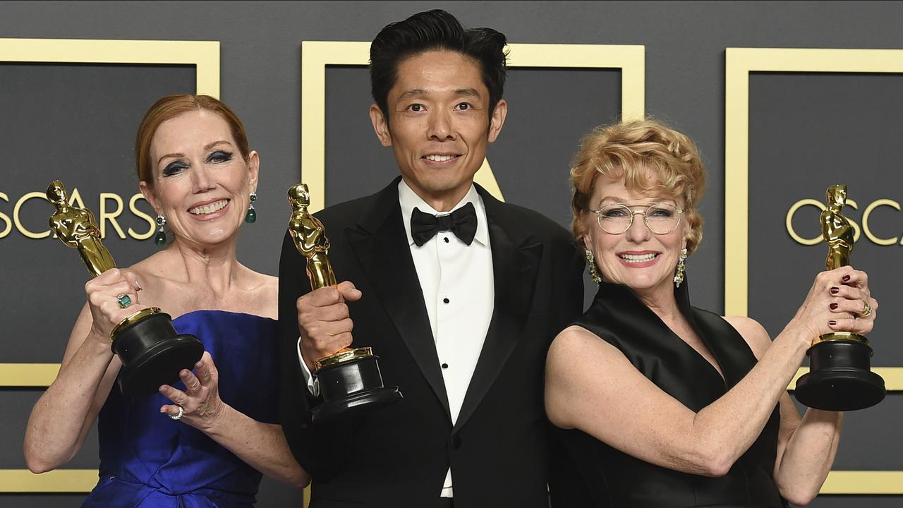 Best Makeup and Hairstyling: <i>Bombshell</i>. From left; Anne Morgan, Kazu Hiro, and Vivian Baker accept the award. Picture: AP