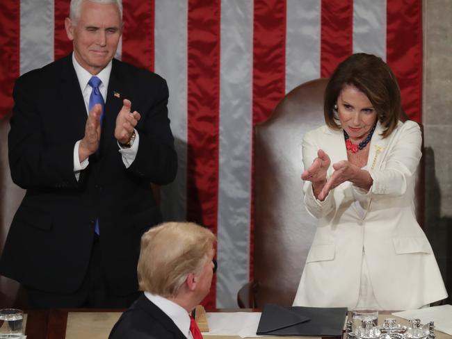 WASHINGTON, DC - FEBRUARY 05: Vice President Mike Pence and Speaker Nancy Pelosi greet President Donald Trump just ahead of the State of the Union address in the chamber of the U.S. House of Representatives at the U.S. Capitol Building on February 5, 2019 in Washington, DC. President Trump's second State of the Union address was postponed one week due to the partial government shutdown.   Chip Somodevilla/Getty Images/AFP == FOR NEWSPAPERS, INTERNET, TELCOS & TELEVISION USE ONLY ==