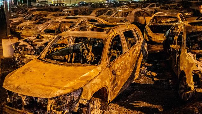 Cars burnt by protestorsduring a demonstration against the shooting of Jacob Blake in Kenosha, Wisconsin. Picture: AFP