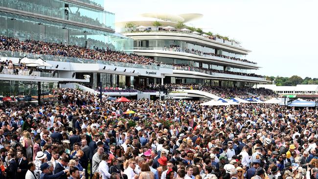 A big crowd watches on during the 2019 Melbourne Cup Day at Flemington Racecourse. Picture: Getty