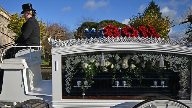 Payne’s coffin was brought to the service in a horse-drawn carriage shortly after 1pm on Wednesday, BST. Picture: Justin Tallis/AFP