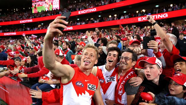 Isaac Heeney with Sydney fans. Picture: Phil Hillyard