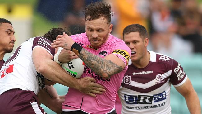 SYDNEY, AUSTRALIA - FEBRUARY 21:  Austin Dias of the Panthersis tackled during the 2025 NRL Pre-Season Challenge match between Manly Sea Eagles and Penrith Panthers at Leichhardt Oval on February 21, 2025 in Sydney, Australia. (Photo by Mark Metcalfe/Getty Images)