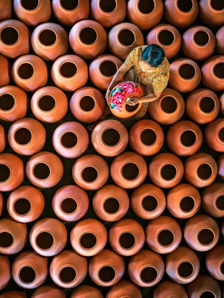 Decorating pots in Myanmar Credit: HLA MOE NAING