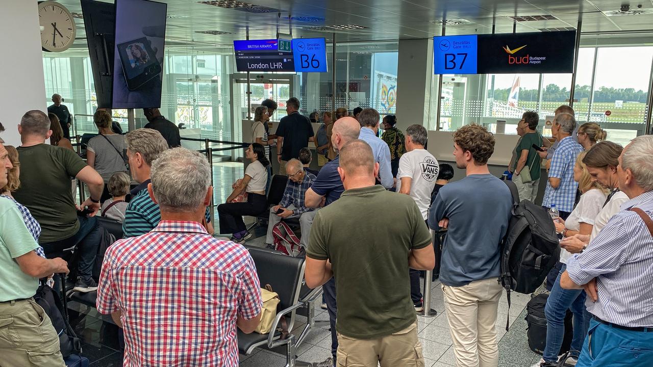 Passengers wait at a boarding gate for a British Airways flight bound for London at Budapest International Airport on August 28, 2023 in Budapest, Hungary. Picture: Getty Images.