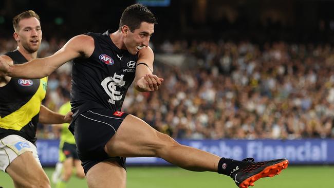 MELBOURNE, AUSTRALIA – MARCH 17: Jacob Weitering of the Blues kicks the ball during the round one AFL match between the Richmond Tigers and the Carlton Blues at Melbourne Cricket Ground on March 17, 2022 in Melbourne, Australia. (Photo by Robert Cianflone/Getty Images)