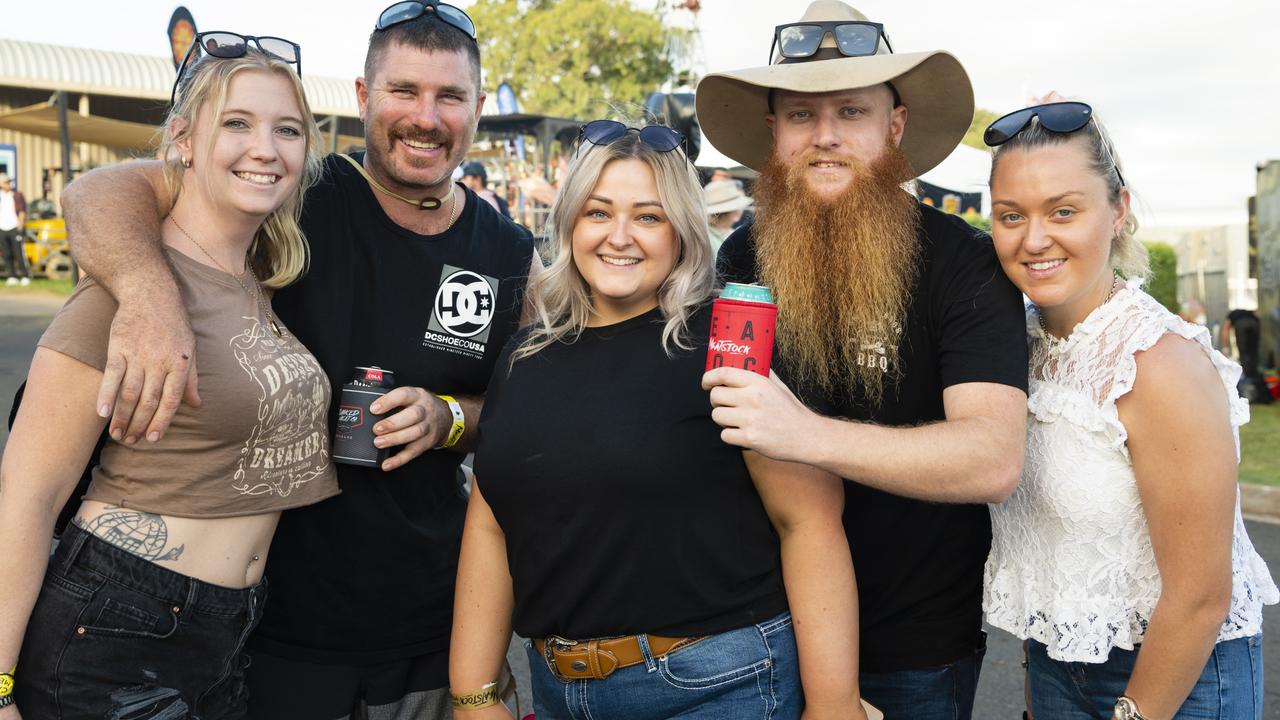 Representing Smokin' Bros are (from left) Sarana Doust, Scotty Whitehead, Kerri Sneddon, Ryan Kropp and Kate Kropp at Meatstock at Toowoomba Showgrounds, Friday, April 8, 2022. Picture: Kevin Farmer