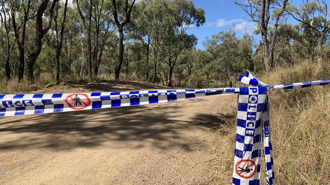 Police tape sealing off Shannonvale Rd about 3km from the site where Mervyn and Maree Schwarz and Graham Tighe were gunned down at Bogie, Central Queensland.