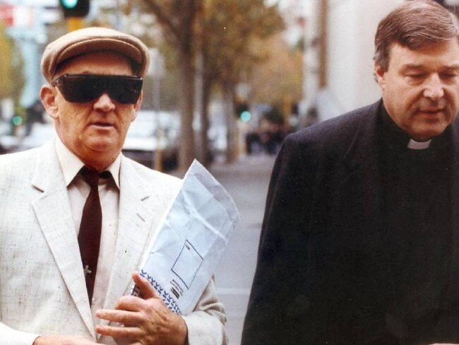 George Pell walking to court with Gerald Ridsdale in 1993.