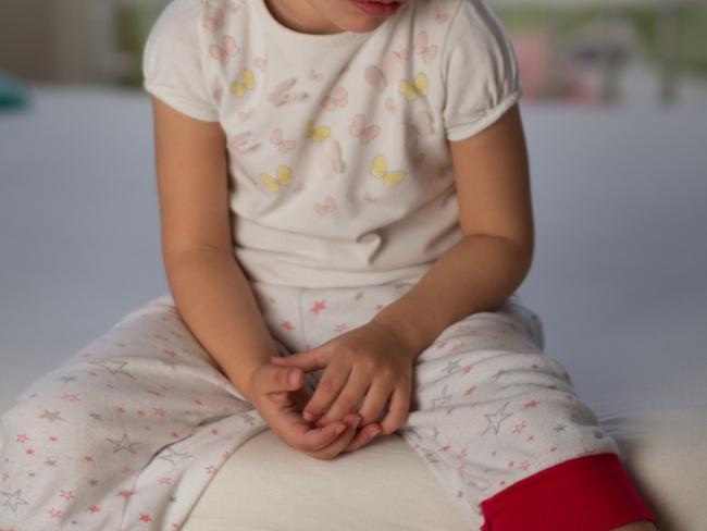 Little girl in hospital, mum in custody over alleged torture, lighter burn