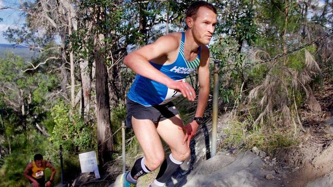 CHAMP: Ben Duffus on the way to the summit. Picture: Simon Green