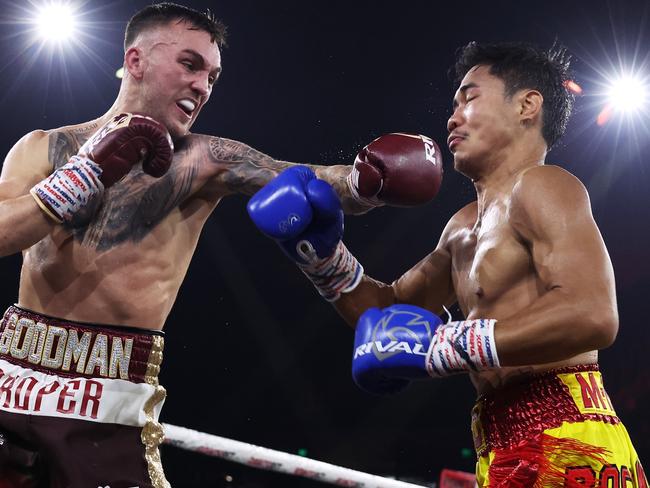 WOLLONGONG, AUSTRALIA - JULY 10:  Sam Goodman punches Chanoi Worawut during their Super Bantamweight World Title Eliminator bout at Wollongong Entertainment Centre on July 10, 2024 in Wollongong, Australia. (Photo by Matt King/Getty Images)