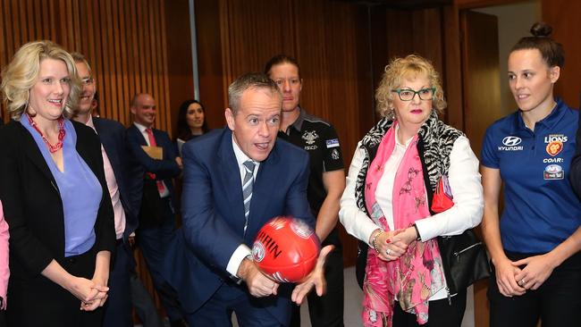 Bill Shorten hand balls the ball at a Parliamentary Friends of Women's AFL inaugural event at Parliament House. Picture Kym Smith