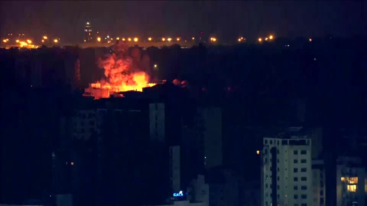 Night-time blasts seen across southern Beirut's skyline