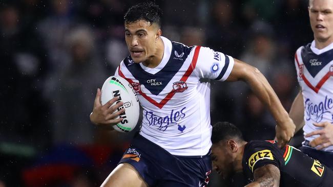 PENRITH, AUSTRALIA - JULY 01: Joseph Suaalii of the Roosters runs the ball during the round 16 NRL match between the Penrith Panthers and the Sydney Roosters at BlueBet Stadium on July 01, 2022 in Penrith, Australia. (Photo by Jason McCawley/Getty Images)