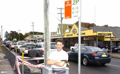 Danny Slattery, owner of Alstonville Quality Meats, is demanding that Ballina Shire Council rangers start policing the two-hour parking limits in the township’s main street, saying too many people are ignoring the posted time restrictions. . Picture: Jerad Williams