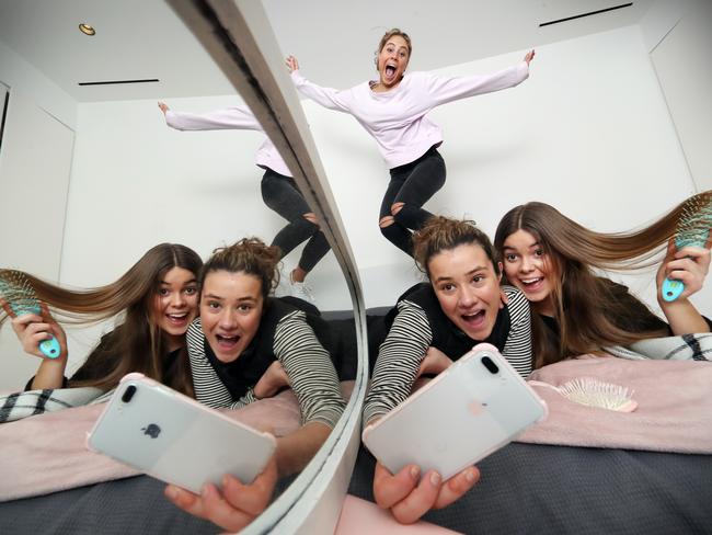 Gab, 17, Jo, 17 and Livvie (jumping), 17. Picture: Alex Coppel