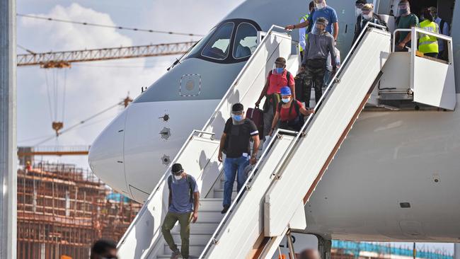 Passengers disembark at the Velana International Airport in Male on July 15 after the Maldives reopened. Picture: AFP