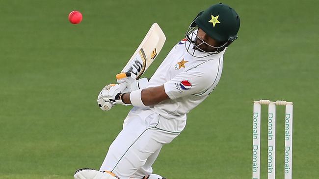 Babar Azam sways out of the way of a rising delivery.