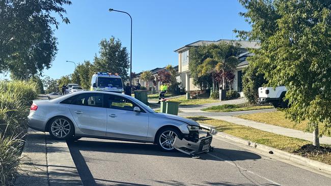 An Audi bearing stolen plates which crashed into a parked car in Pimpama. Picture: Supplied.