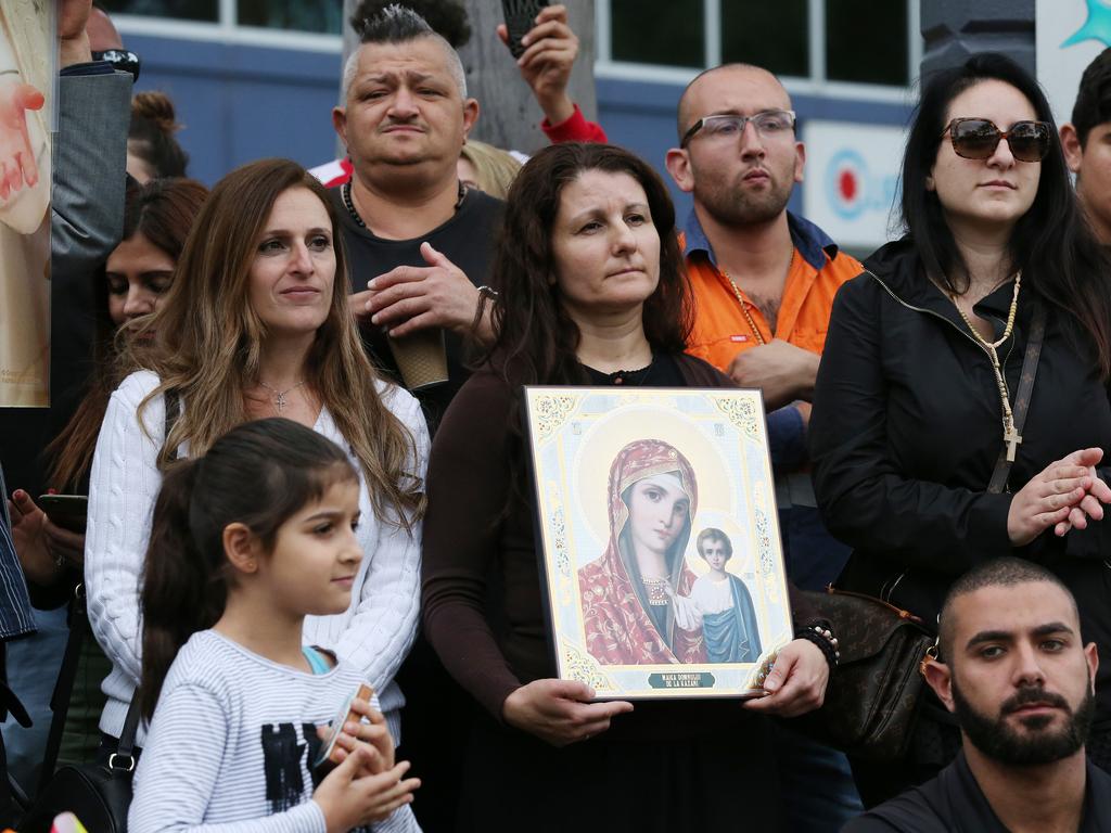 Protestors have begun to gather outside Kiis FM headquarters in North Ryde to protest against comments Kyle Sandilands made about Christians and the Virgin Mary. Protest leader Georgie Mark speaks to the protestors. Picture: David Swift.