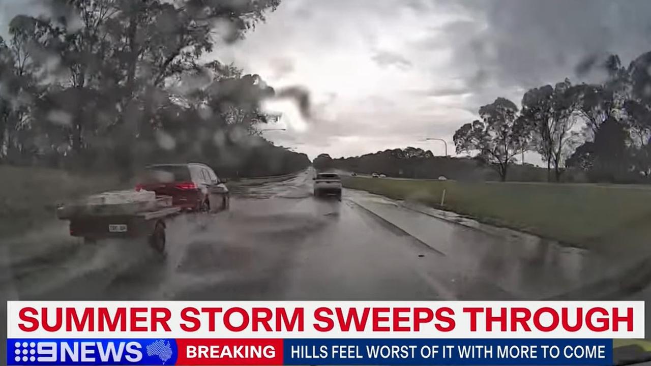 There were heavy puddles across the Southeastern Freeway after heavy rainfall, disrupting traffic. Picture: 9NEWS