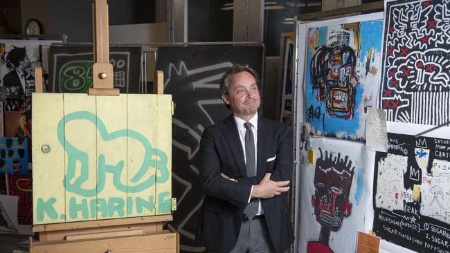 NGV Director Tony Ellwood with the stolen door from Keith Haring’s famed mural in Collingwood. The door will now feature in the Crossing Lines exhibition at NGV. Picture: Supplied