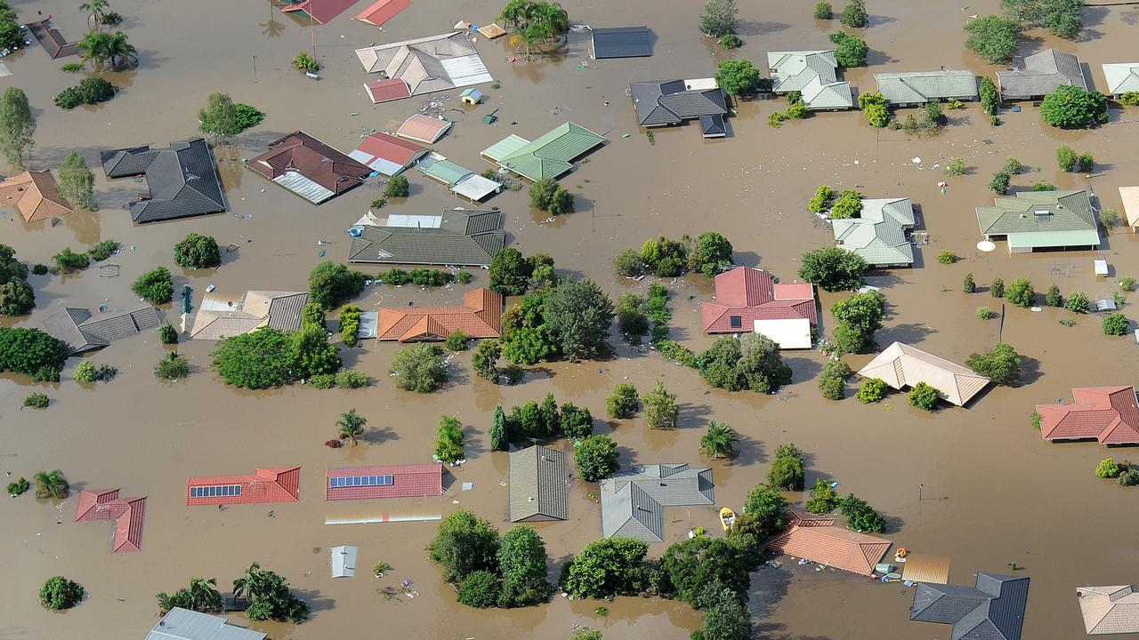 Homes near Ipswich west of Brisbane are inundated by flood waters Jan. 12, 2011. (AAP Image/Dave Hunt)