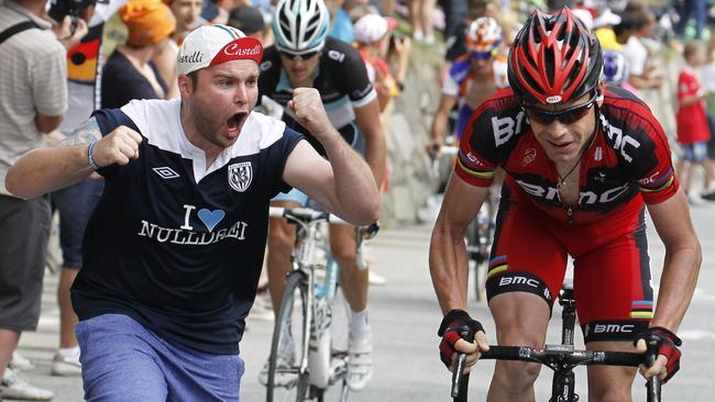 Cadel Evans climbs the Alpe d’Huez on his way to winning the 2011 Tour de France.