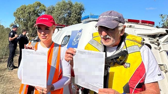 Police and authorised officers slap Animal Justice Party MP Georgie Purcell and anti-duck hunting campaigner Laurie Levy. with a ban notice. PICTURE Supplied