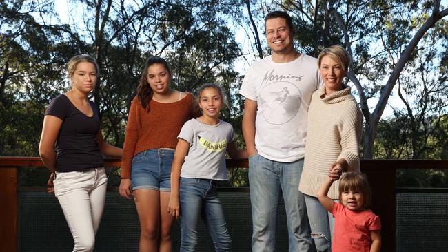 Matt Bashford and Jonty Bush with daughters (from left) Grace, Annie, Ella and Albie.