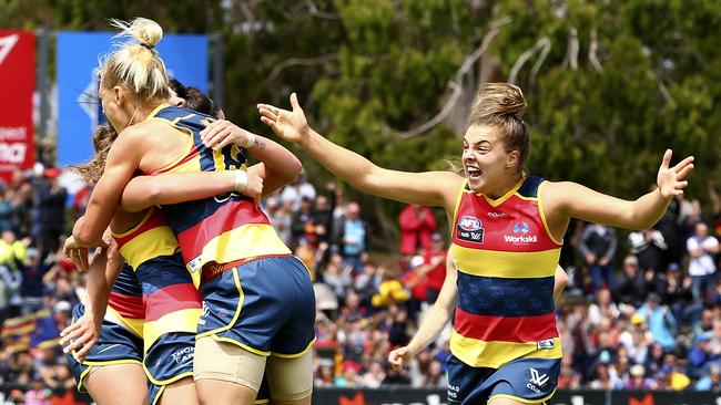 Adelaide Crows players celebrate their big win over Carlton on the weekend. Picture Sarah Reed