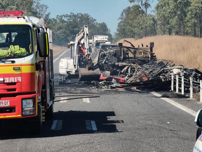 The charred remains of a semi trailer sitting on the Bruce Highway, 37km south of Miriam Vale, after a two truck crash on August 5, at 11.15pm. Picture Rodney Stevens