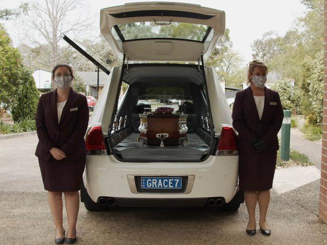 Masked White Lady Funerals attendants