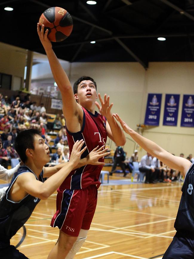 It's old boys day this weekend at TSS. TSS basketball (maroon) vs. BGS. Photo of Maika Shortland. Photo by Richard Gosling.