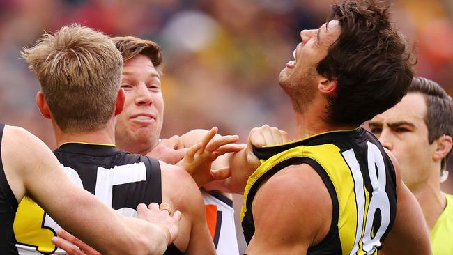 Toby Greene gives Alex Rance a jumper punch. Picture: Michael Klein