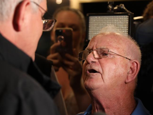 DAILY TELEGRAPH, APRIL 06, 2022: A man yells about the pension for a good 5min to the Prime minister Scott Morrison as he visits the Edgeworth Tavern  in Edgeworth, Newcastle.Picture: Damian Shaw