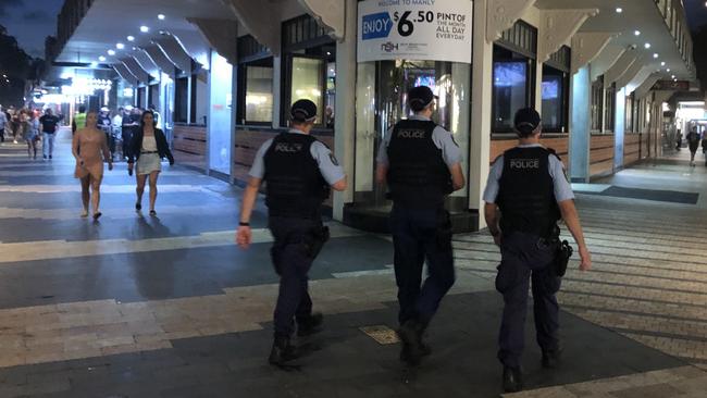 Police officers on foot patrol on The Corso at Manly had to intervene in an alcohol-fuelled late night brawl which led to two men being charged with affray. File picture: Jim O'Rourke