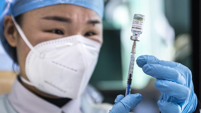 A medical worker prepares a dose of the COVID-19 vaccine in Wuhan, China. Picture: Getty Images